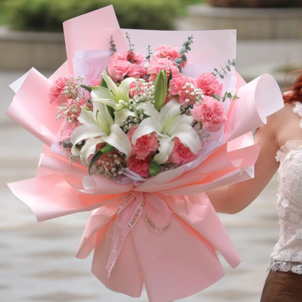 Ramo de 19 claveles rosas y 2 lirios: Elegancia pura