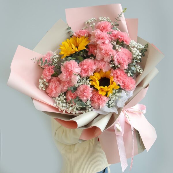 Bouquet de 19 œillets roses et 2 tournesols - Pure Joie