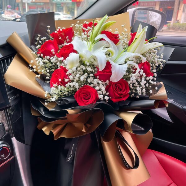 Bouquet di 11 Rose Rosse e 2 Gigli Bianchi - Portafortuna