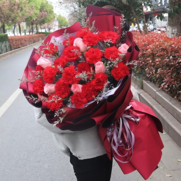 Sweet Reunion: Mixed Red Carnations & Pink Roses Bouquet
