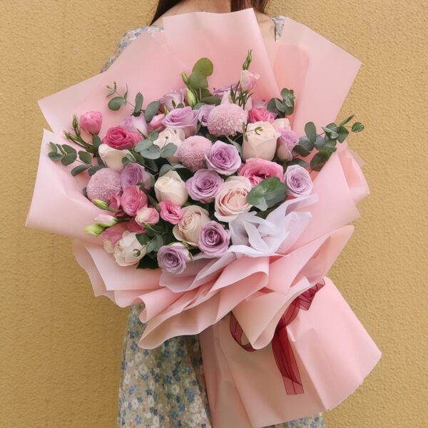 Bouquet "Notte Stellata" con 19 Rose Ocean Song e Champagne
