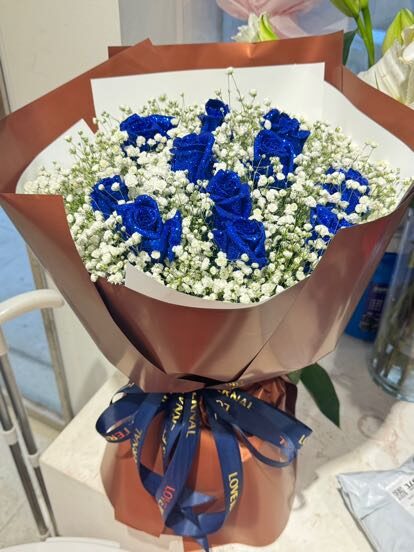 Bouquet di 11 Rose Blu - Sogni Celesti real bouquet photo