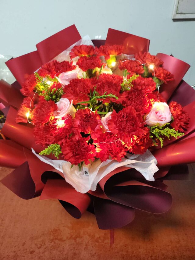 33 Rose e Garofani Misti - Dolce Ricongiungimento real bouquet photo