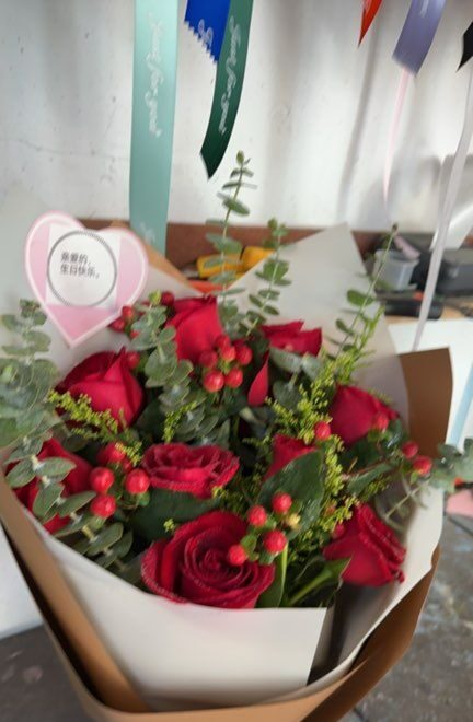 11 Rose Rosse: Amore Incrollabile real bouquet photo