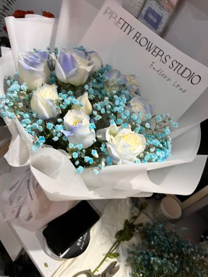 Bouquet di 11 Rose Blu Ghiaccio - Bacio Dolce real bouquet photo