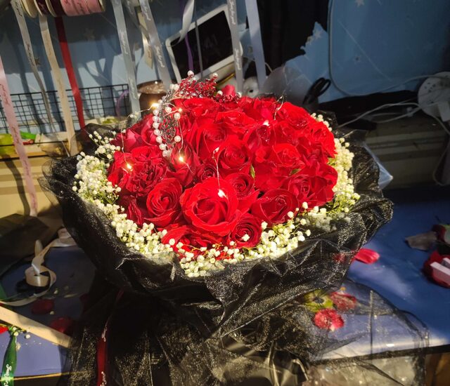 Bouquet di 11 Garofani Rossi - Radioso Splendore real bouquet photo