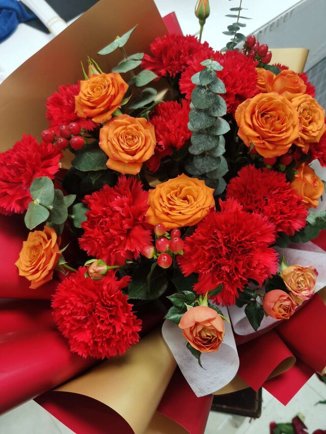 Bouquet di 11 Garofani Rossi - Radioso Splendore real bouquet photo