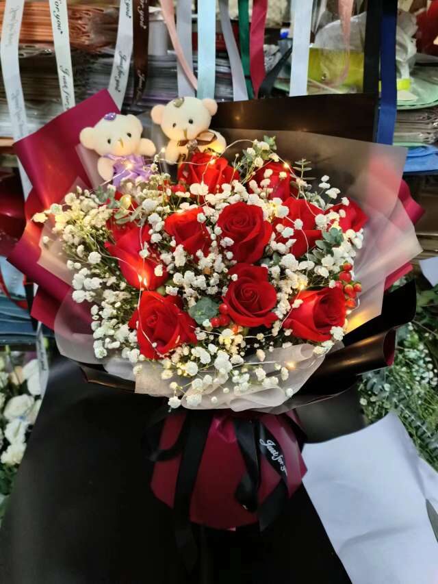 11 Rose Rosse: Amore Incrollabile real bouquet photo