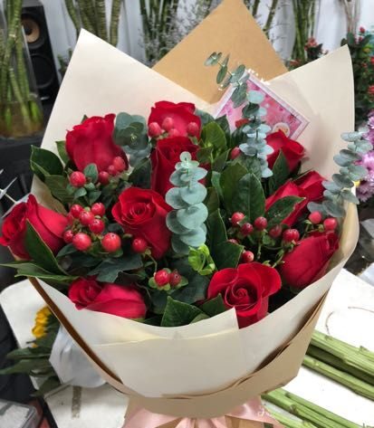 11 Rose Rosse: Amore Incrollabile real bouquet photo