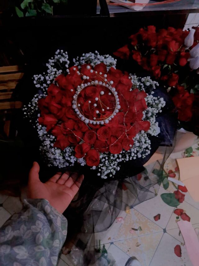 Bouquet 52 Rose Rosse - Cuore Puro real bouquet photo
