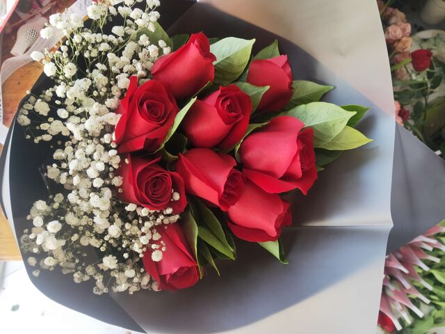 Bouquet di 9 Rose Rosse - Eleganza Radiosa real bouquet photo